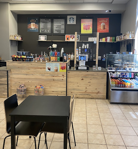 Arif cafe "We Proudly Serve" STARBUCKS - Colorado Springs