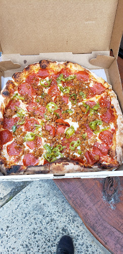 Roaming Woodfired Pizza - Hospitality and gastronomy