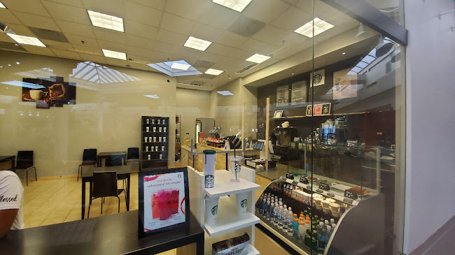 Arif cafe "We Proudly Serve" STARBUCKS