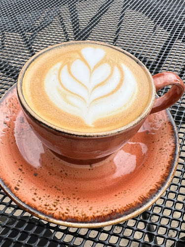 Comentarii opinii despre Land of a Thousand Hills Coffee & Bakery