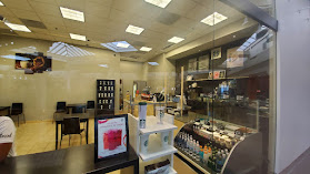 Arif cafe "We Proudly Serve" STARBUCKS