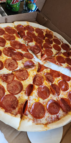 Geno's Pizza By The Slice - Hospitality and gastronomy